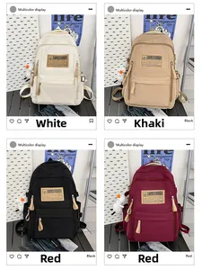 Minimalist large capacity backpacks in white, khaki, black and burgundy with duck pendant