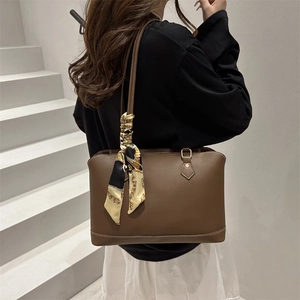 Brown leather tote bag with silk scarf on shoulder strap, large capacity handbag for women