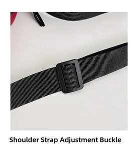 Detail view of adjustable black nylon shoulder strap with plastic buckle for crossbody bag