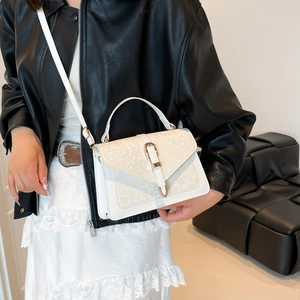 White snake pattern mini crossbody bag with gold buckle and top handle for women