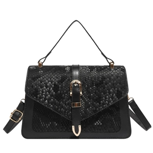 Vintage black leather crossbody bag with snakeskin texture flap and golden hardware