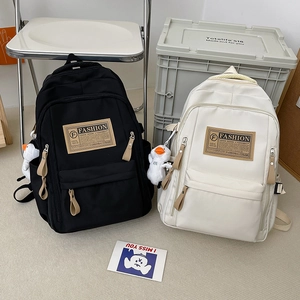 Minimalist large capacity school backpack with fashion label and duck charm