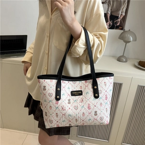Floral knit tote bag with bear print and black leather straps for summer fashion wear