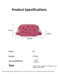 Pink PU saddle bag with cherry pattern, dimensions 19.5cm x 11cm x 6.5cm details