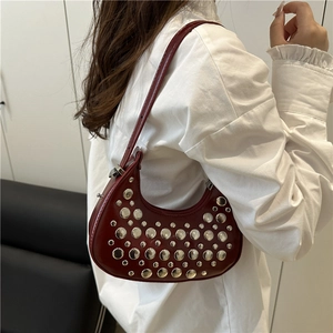 Burgundy crescent hobo bag with silver rivets and adjustable shoulder strap for women