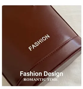 Close-up of wine red lychee pattern leather bucket bag with silver Fashion lettering