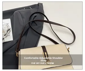 Detail of adjustable leather strap and golden U-shaped buckle on off-white crossbody bag