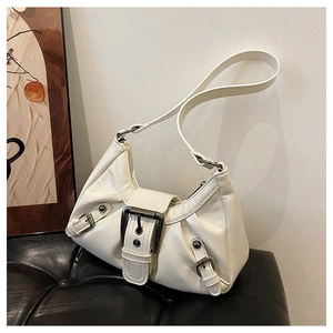 Detail of off-white Y2K shoulder bag with ruched leather and vintage silver buckle