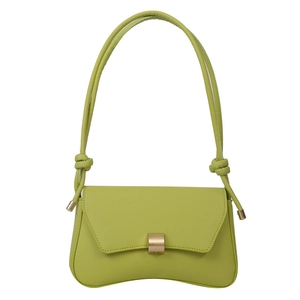 Lime green baguette shoulder bag with knotted strap detail and golden metal clasp