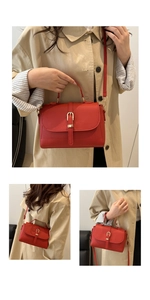 Detailed views of red lychee pattern leather handbag with gold U-shaped buckle and strap
