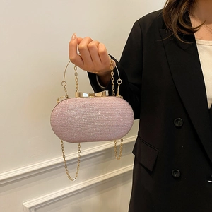 Pink sequin evening clutch bag with gold chain and bow metal clasp for party