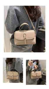 Detailed views of beige lychee leather handbag with gold buckle and adjustable strap