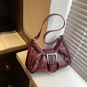 Vintage Y2K burgundy pleated shoulder bag with silver buckle and glossy finish