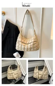 Detail view of khaki quilted puffer tote bag with adjustable strap for commuting