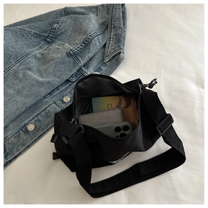 Interior view showing the storage capacity for a wallet, phone, and daily essentials