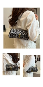 Macro detail of leopard print baguette bag with golden buckle and sleek shoulder strap