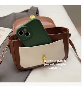 Internal view of the retro crossbody bag showing large capacity for a smartphone