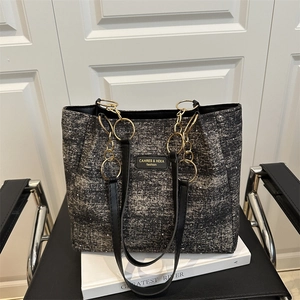 Chic grey tweed tote bag with golden chain handle and leather shoulder strap for women
