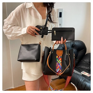 Modern black PU leather 4-piece handbag set with colorful geometric woven straps
