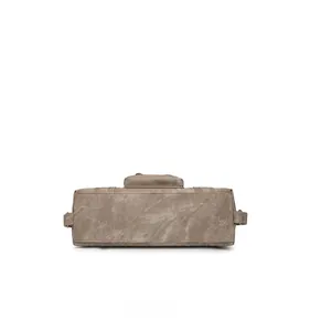 Detail view of the rectangular washed canvas bag base showing reinforced stitching