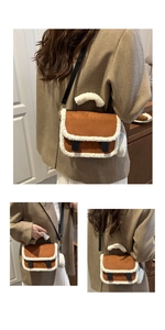 Detail of suede crossbody bag with plush faux fur trim and matching round coin purse