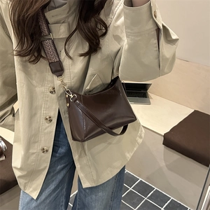 French style dark brown faux leather baguette bag with geometric woven shoulder strap