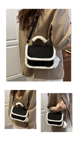 Detail of suede crossbody bag with white faux fur trim and plush ball accessory
