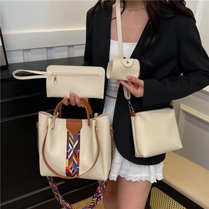 Off-white 4-piece tote bag set for women with ethnic woven strap and PU leather finish