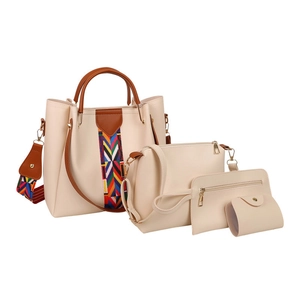 Off-white 4-piece tote set with brown trim and colorful geometric strap accents