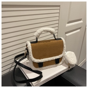 Detail of suede crossbody bag with sherpa fleece trim and mini round coin purse