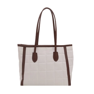 Quilted tote bag with cream grid pattern and contrast brown shoulder straps for daily use