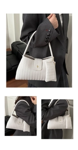 Detail of white woven texture shoulder bag with small pendant pouch for women