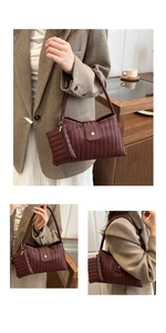 Detail view of burgundy woven leather shoulder bag set with matching zipper pouch