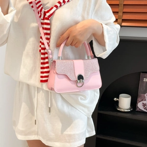 Elegant pink glitter crossbody box bag with silver metal buckle and top handle