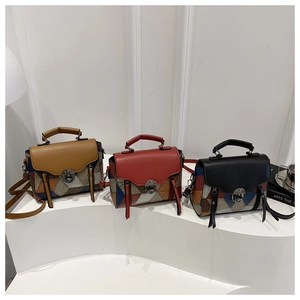 Three vintage patchwork leather bags in brown, red, and black with snake pattern details