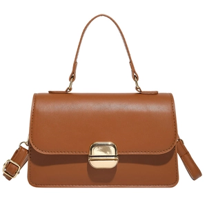 Minimalist brown faux leather crossbody bag with top handle and gold square buckle