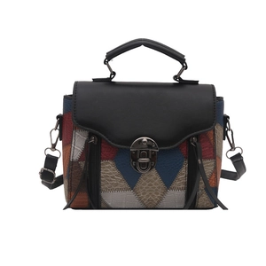 Fashion patchwork leather handbag with animal embossed textures and metallic lock closure