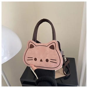 Cute pink cat-shaped children's crossbody bag with brown leather handles and strap
