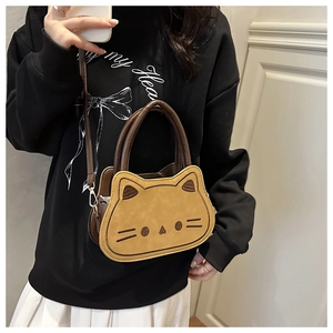 Cute cartoon cat-shaped shoulder bag in brown faux leather with detailed cat embroidery