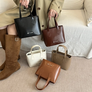 Stylish PU leather bucket tote bags for women in five colors with a metal fashion logo