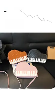 Creative piano shaped crossbody bags in black brown and pink with dotted pattern details