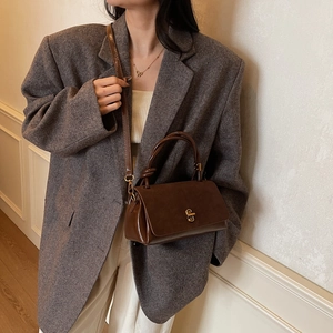 Classic dark brown suede leather shoulder bag with gold twist lock for daily commuting