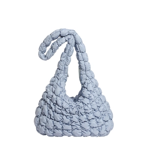 Light blue quilted cloud bag with puffy bubble texture and comfortable top handle