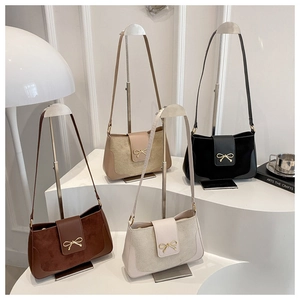 Minimalist shoulder bags in four colors with decorative golden bow metal buckles
