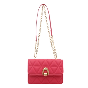 Rose pink quilted chain crossbody bag with golden hardware on a clean white background