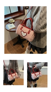 Detail of pink faux fur crossbody bag with white leather heart and red strap