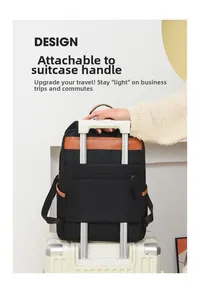 Détail du sac à dos business noir avec sangle de bagage intégrée pour valise trolley