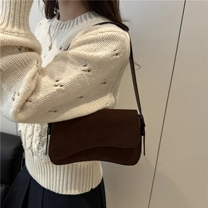 Brown suede underarm shoulder bag for women with flap design and vintage winter styling