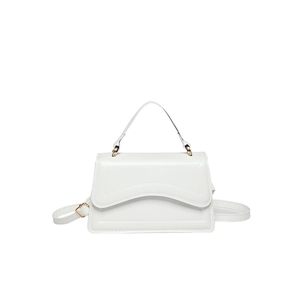 Minimalist white leather shoulder bag with stylish wave design flap and gold hardware