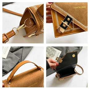 Close-up of vintage brown chain handbag showing hand-stitched detail and metal lock